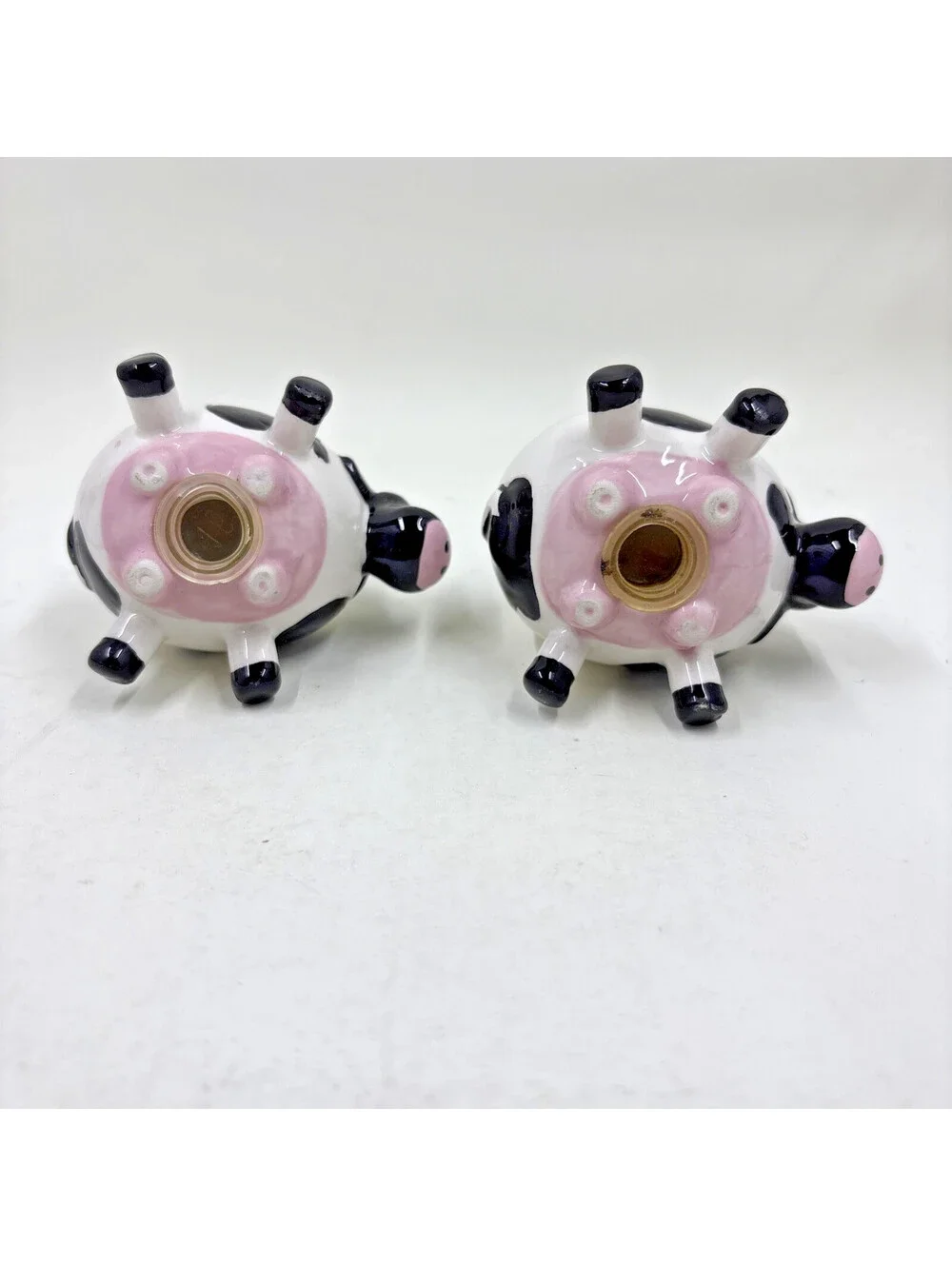 Farmhouse Style Mini Cow Salt and Pepper Shakers Resting on Utters 2.5